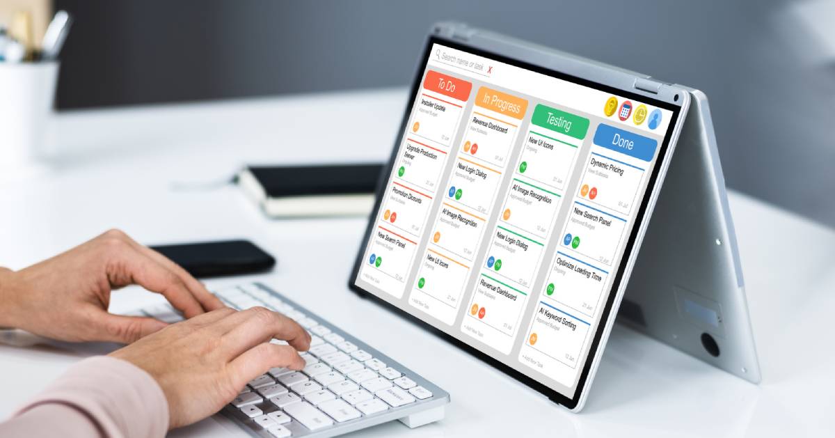 A person working with a kanban board on their tablet.