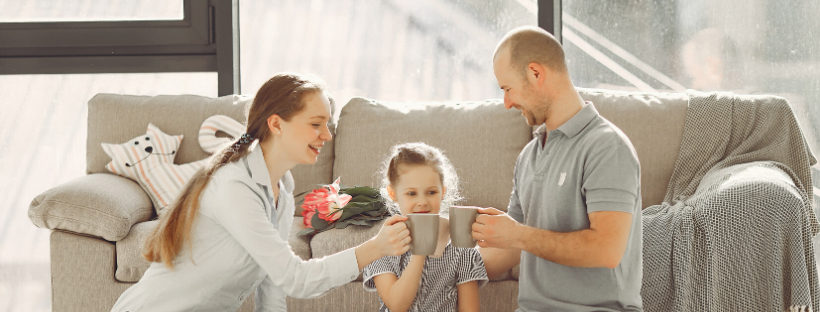 A happy family having a cup of coffee and quality time.