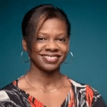 A photo of Shelley Sanidform smiling.