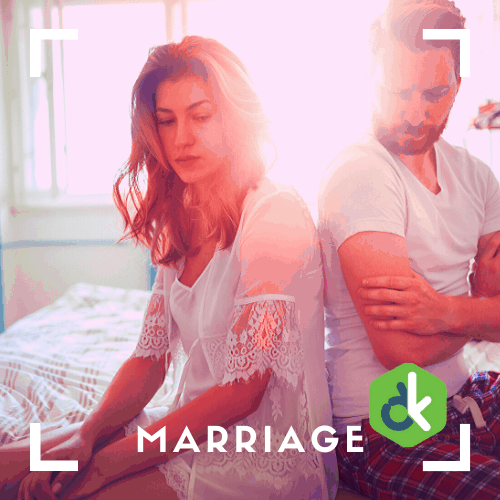 A couple going through a fight. Both partners are sad.