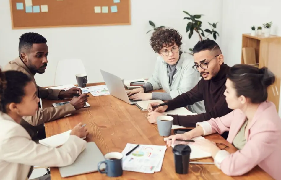 check list Virtual assistant team discussing company statistics.