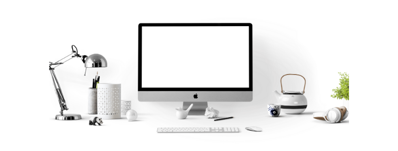 Web Design & Development A clean desk: an iMac, tea pot, desk lamp, pen holder, and more.